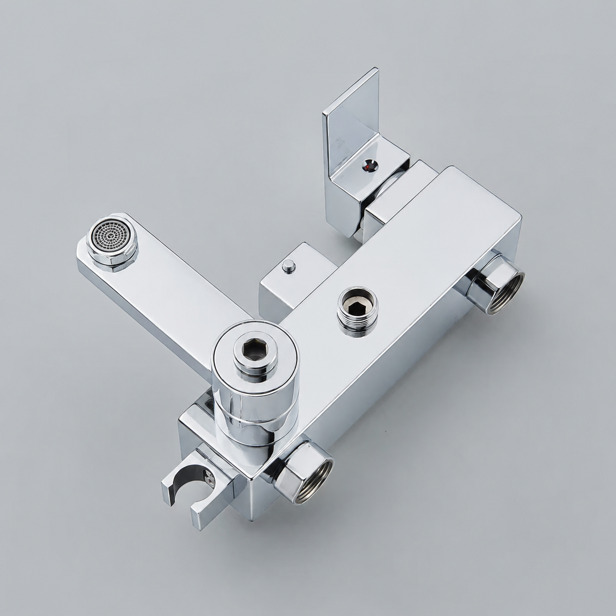 Polished chrome shower column with rain head and bath mixer - wall mounting detail