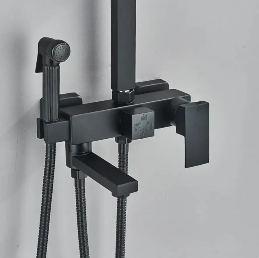 Matt black shower column with rain head and bath mixer - fitted in a modern bathroom