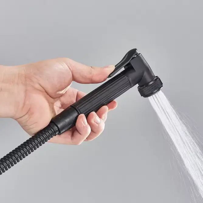 Matt black thermostatic shower column with digital display - fitted in a modern bathroom